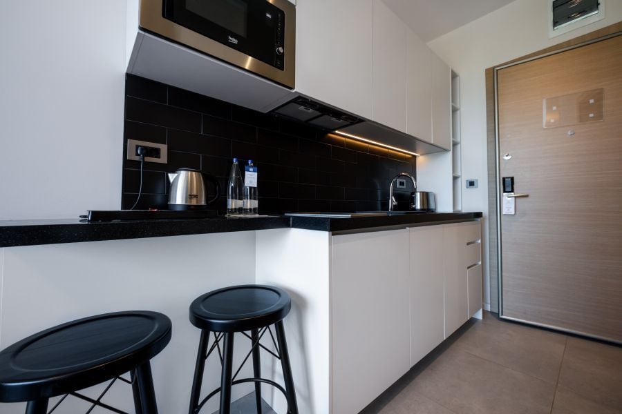 Studio with Sea View compact kitchen with a breakfast counter
