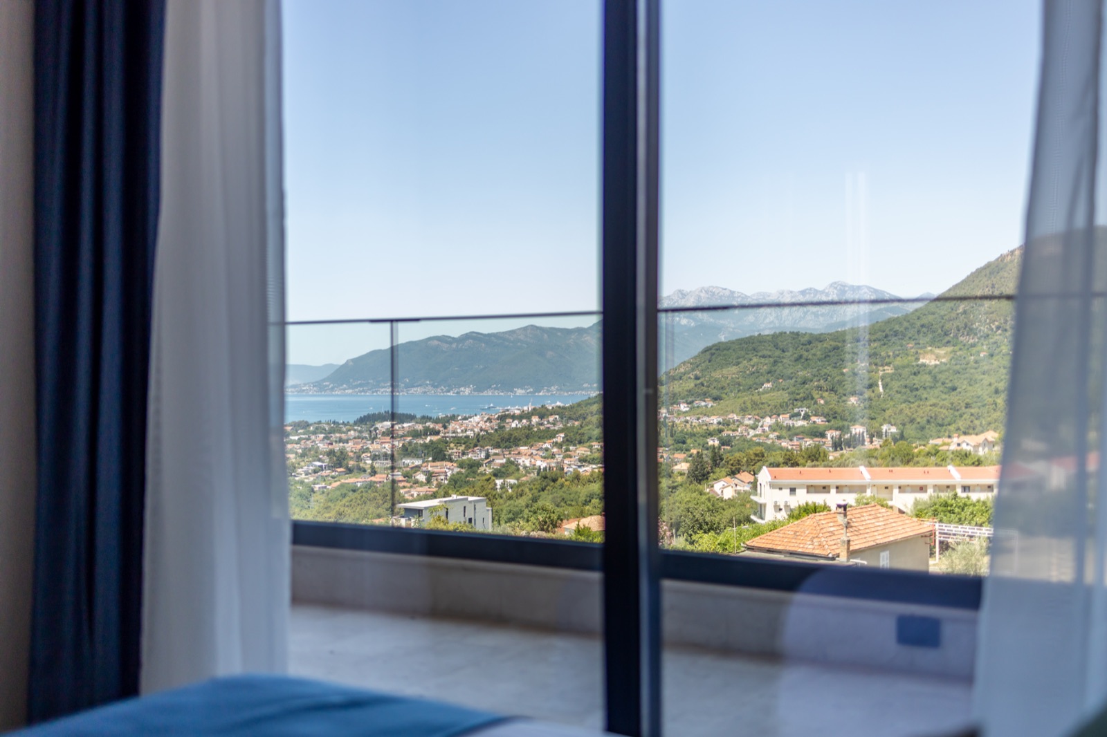 Bay view from inside a private Nomio apartment